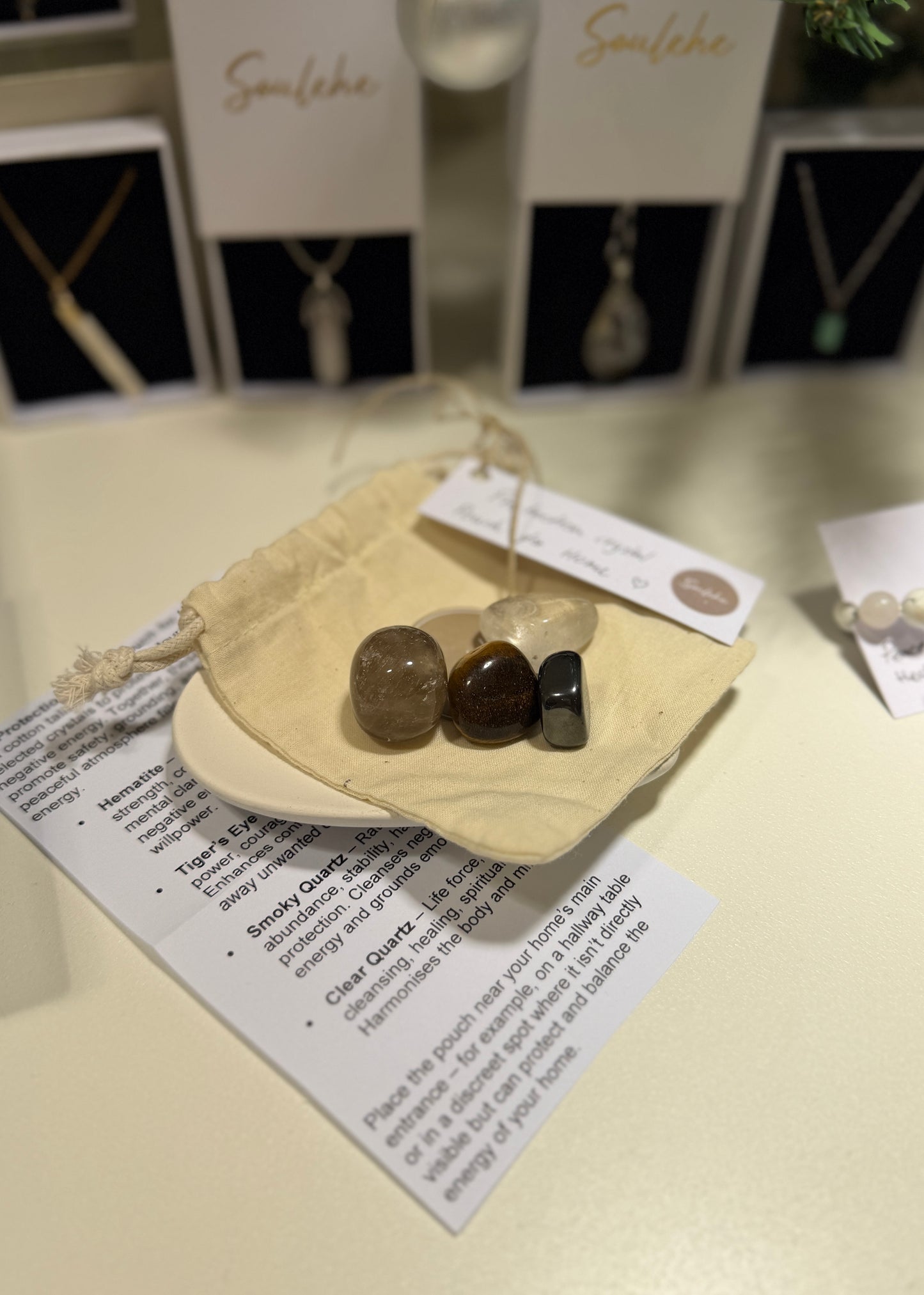Cotton protection crystal pouch with Hematite, Tiger’s Eye, Smoky Quartz and Clear Quartz.