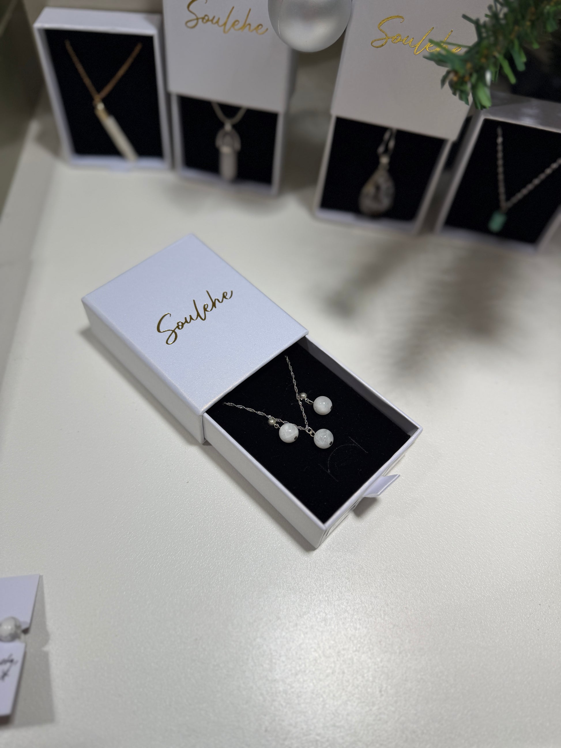 Silver Moonstone necklace with matching Moonstone earrings.