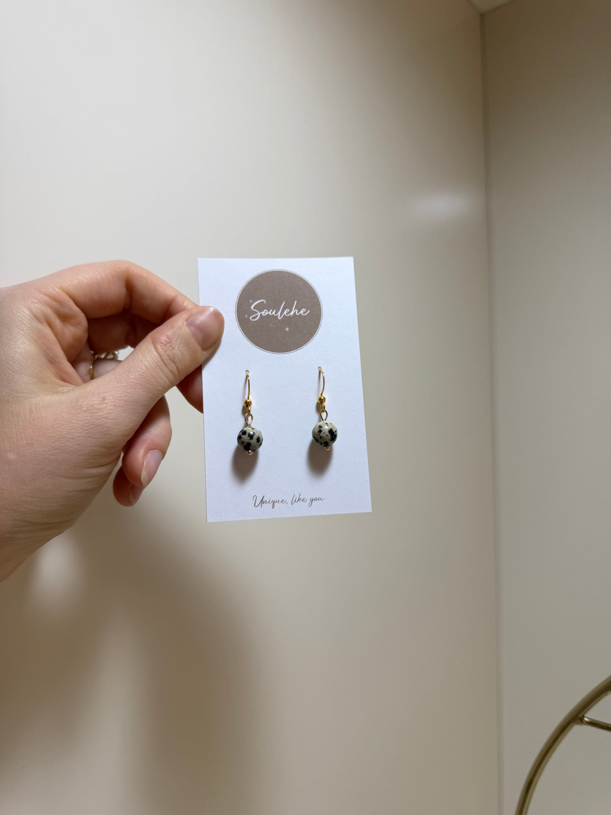 Gold hook earrings with Dalmatian Jasper beads.