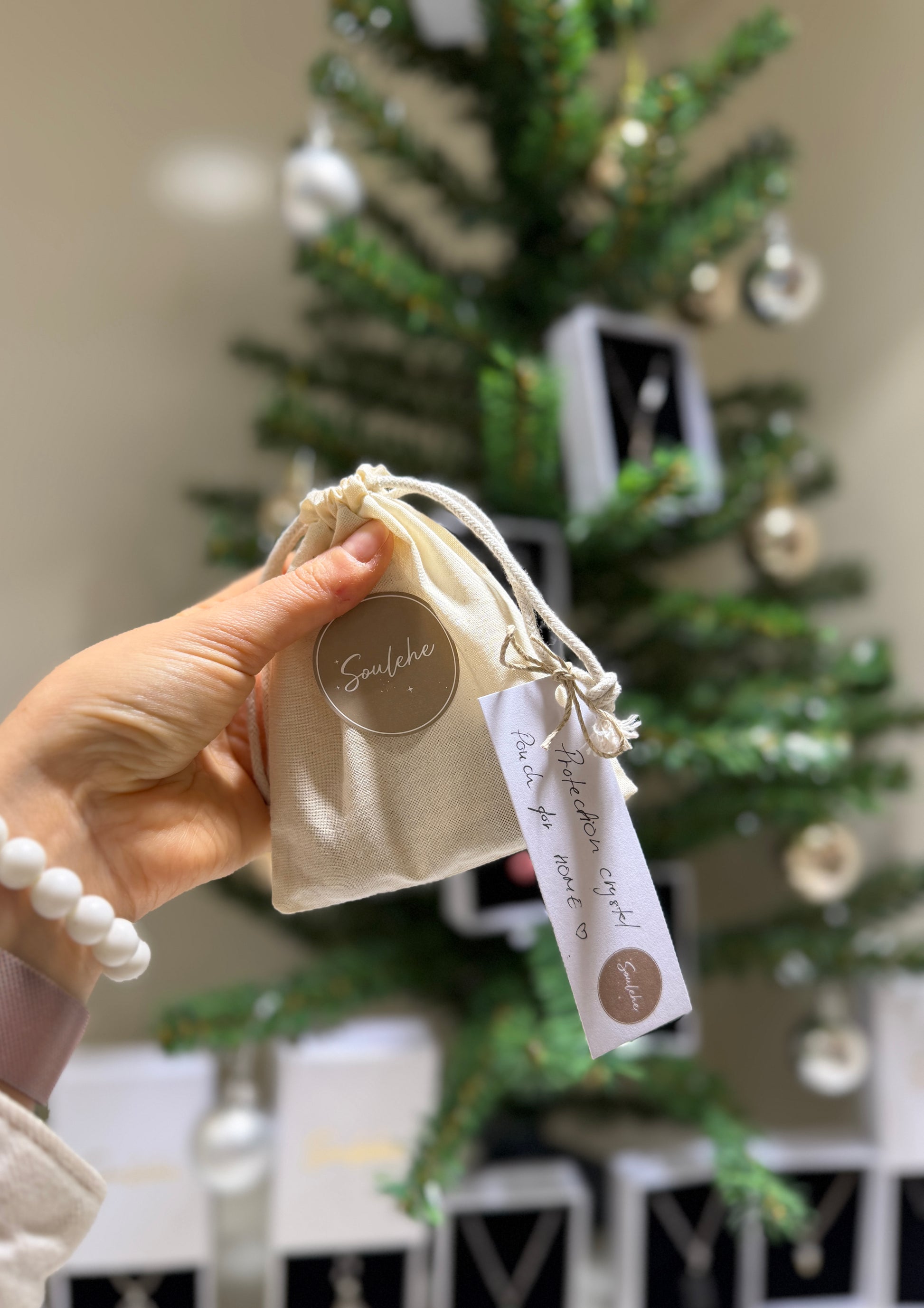 Cotton protection crystal pouch with Hematite, Tiger’s Eye, Smoky Quartz and Clear Quartz.