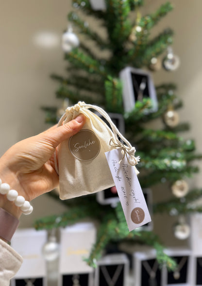 Cotton protection crystal pouch with Hematite, Tiger’s Eye, Smoky Quartz and Clear Quartz.