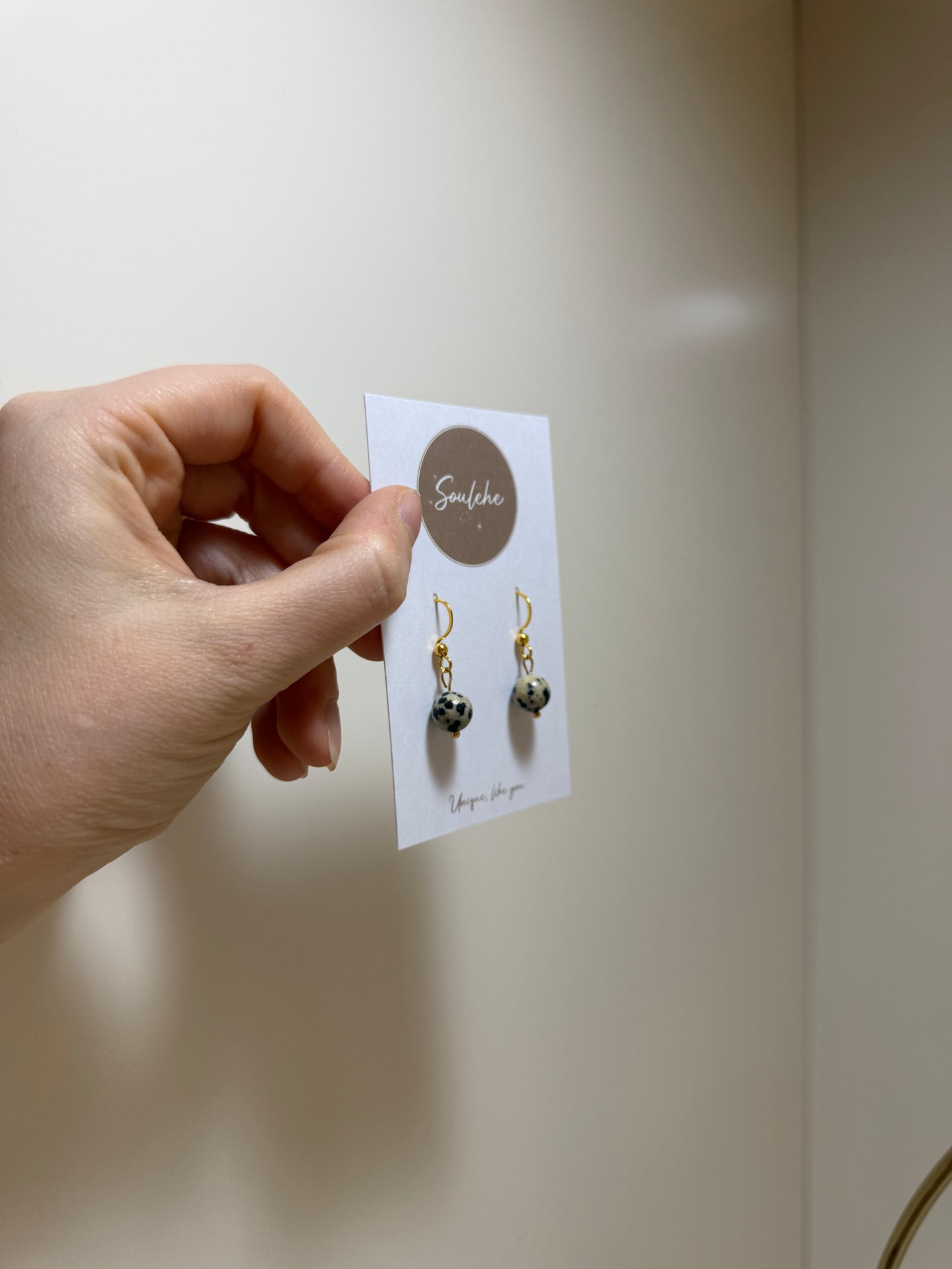 Gold hook earrings with Dalmatian Jasper beads.