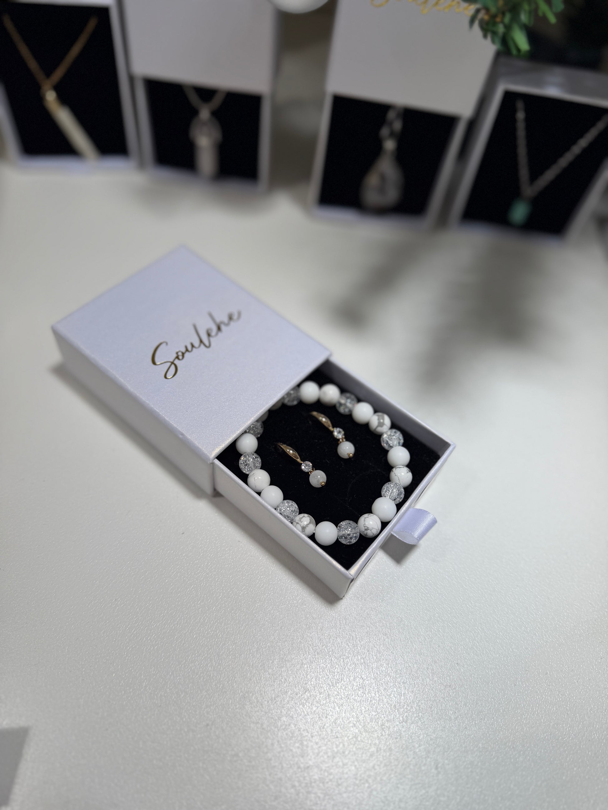 Gold Moonstone earrings with White Agate and Howlite bracelet.