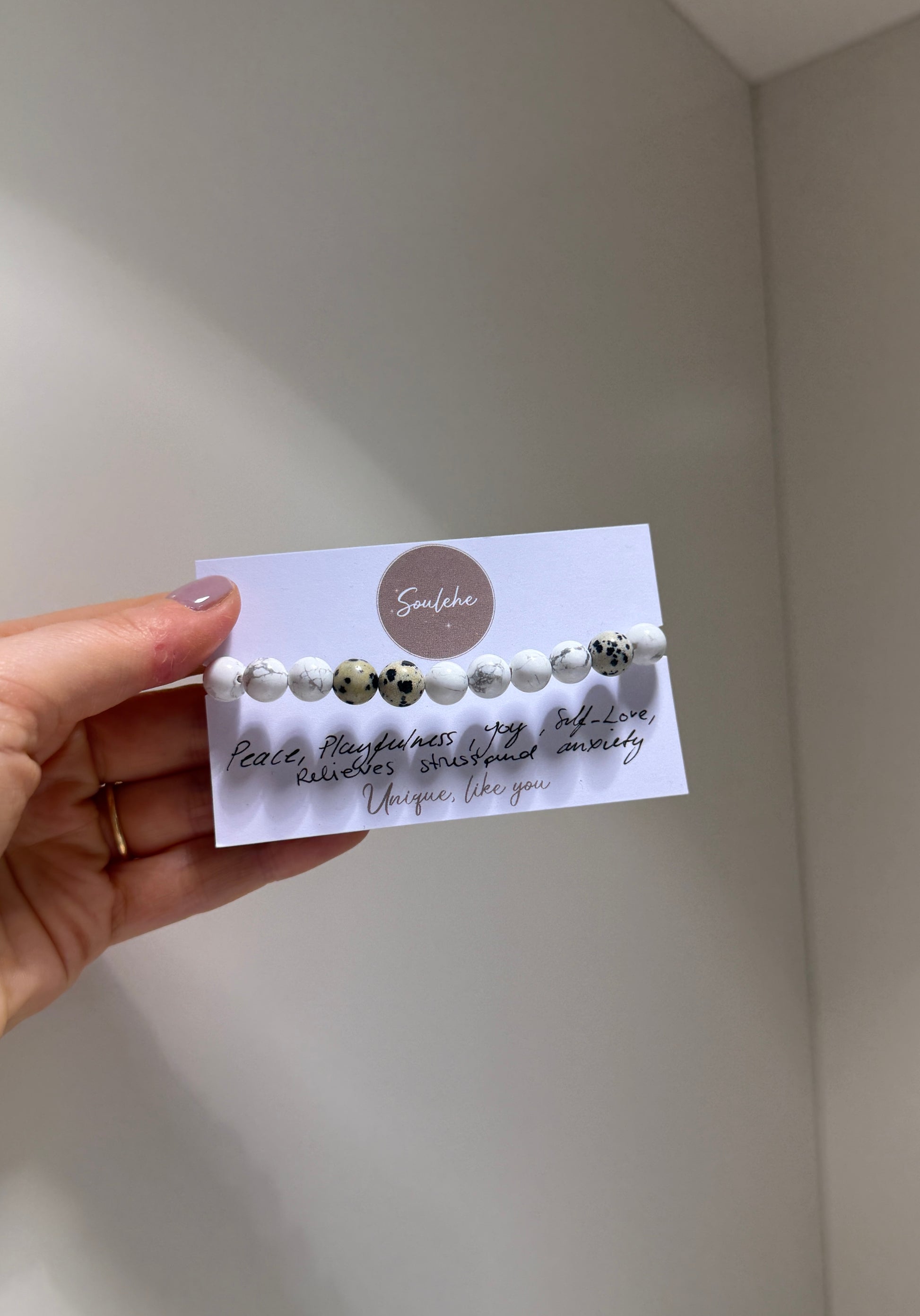 Howlite and Dalmatian Jasper beaded bracelet.