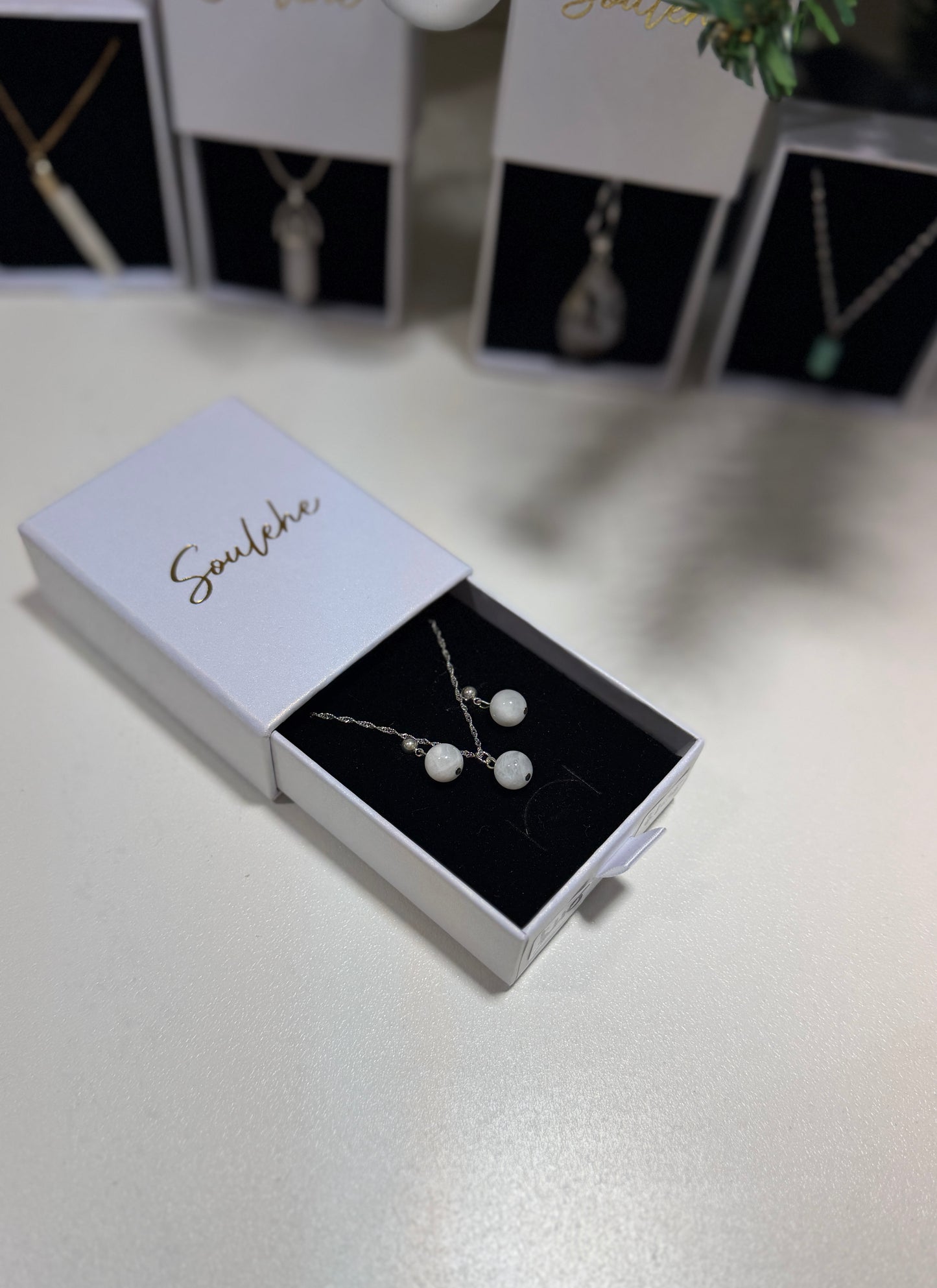 Silver Moonstone necklace with matching Moonstone earrings.