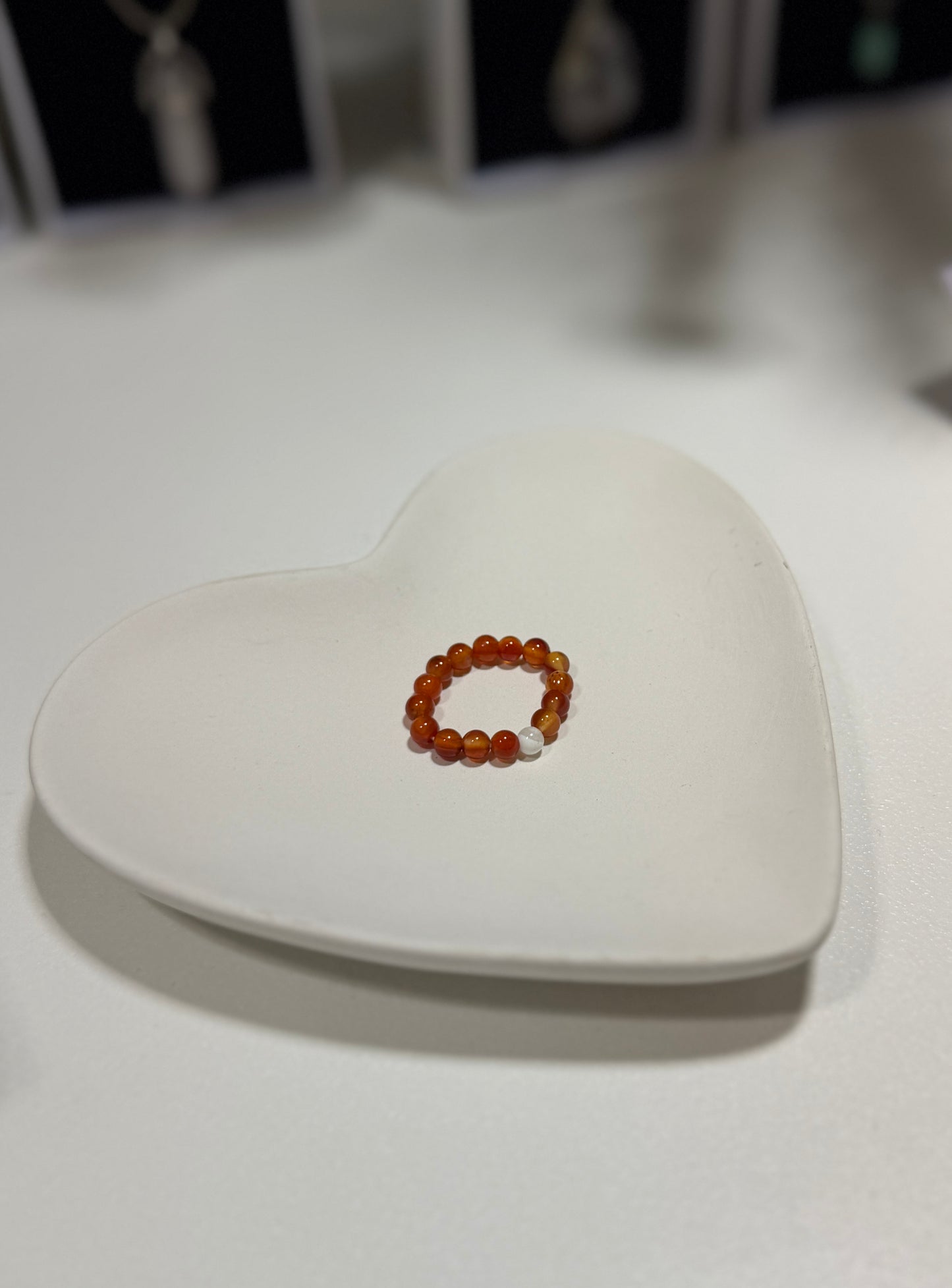 Small amber bracelet on a heart-shaped white stone