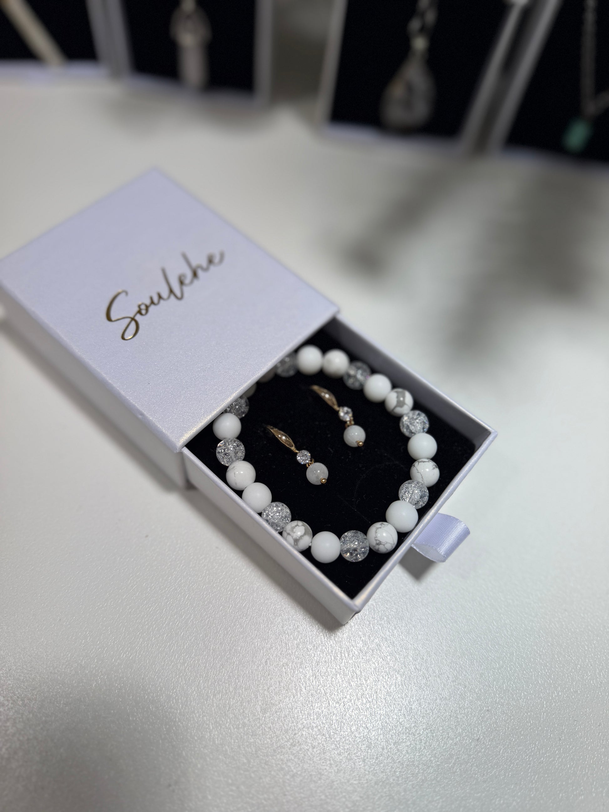 Gold Moonstone earrings with White Agate and Howlite bracelet.